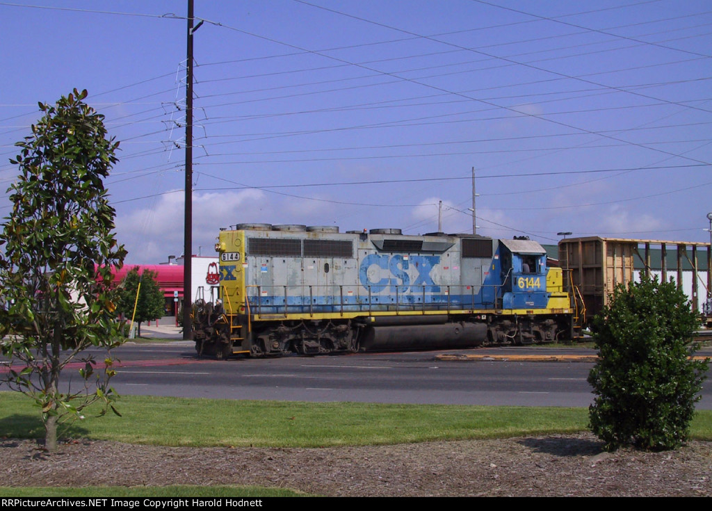 CSX 6144 leads a local thru town